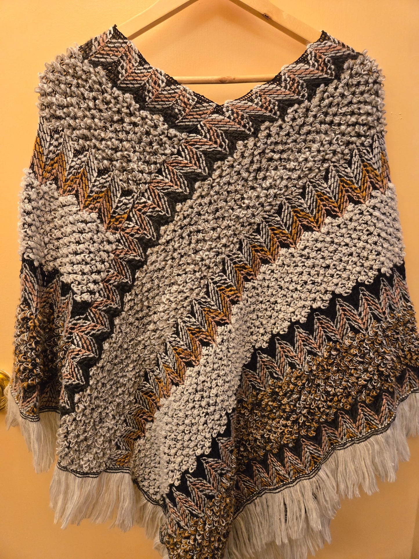 Mane & Feather Knit Ponchos